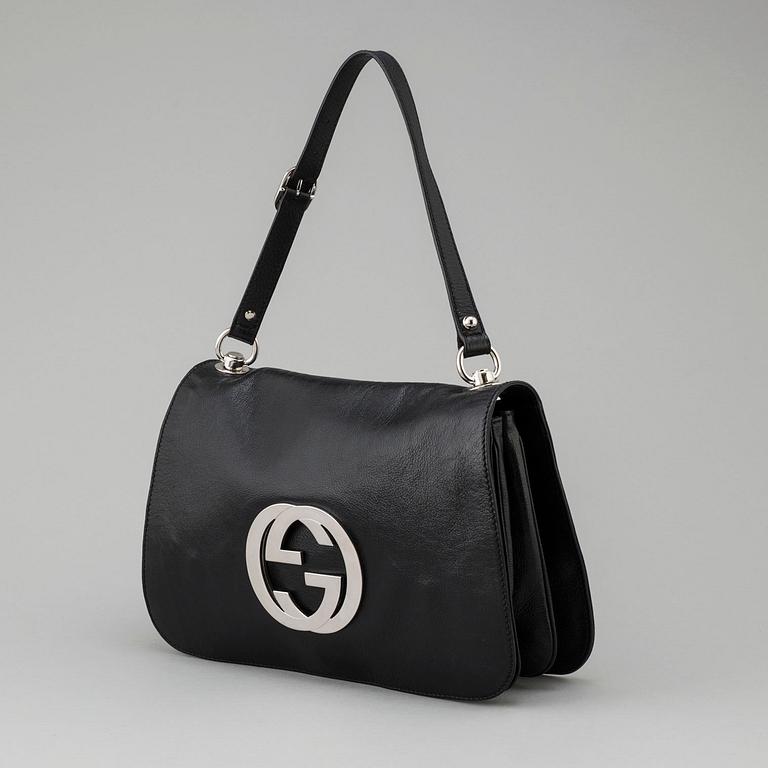 A bag by Gucci.