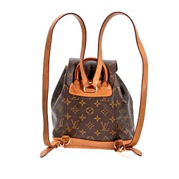 A monogram canvas back-pack by Louis Vuitton.