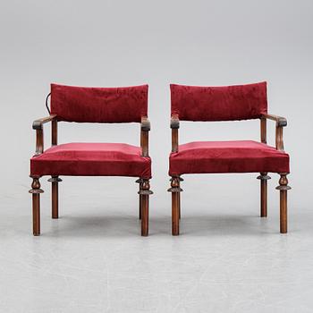 A pair of Swedish Grace 1920's armchairs.