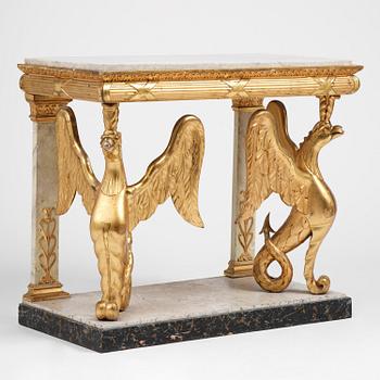 A Swedish Empire gilt wood and white marbel console table.