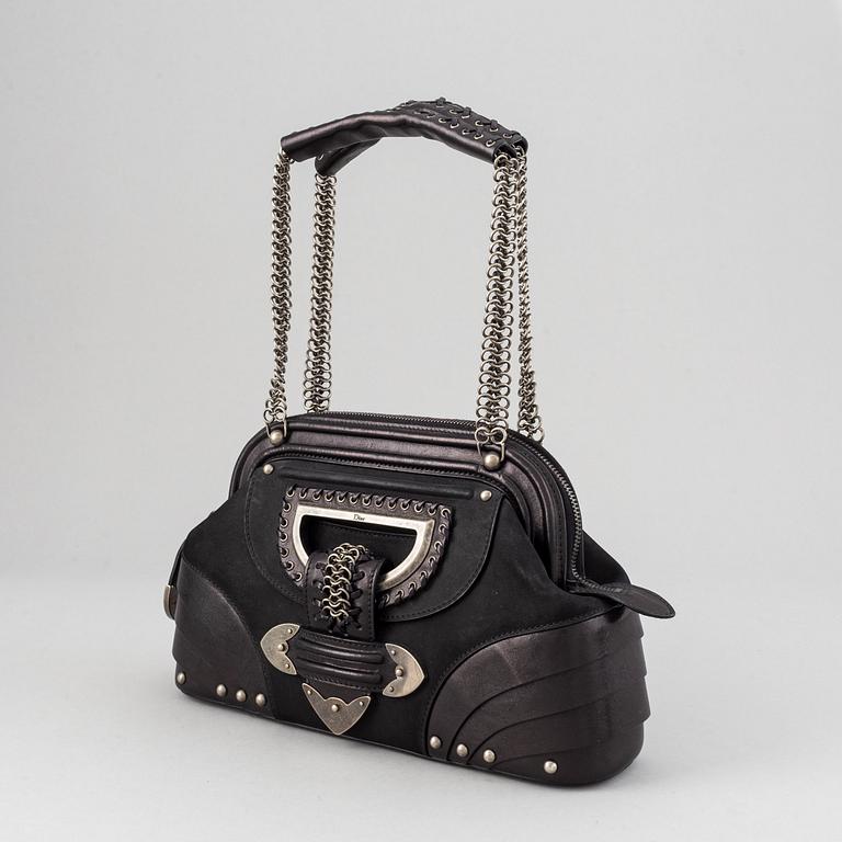 Christian Dior, a leather bag.