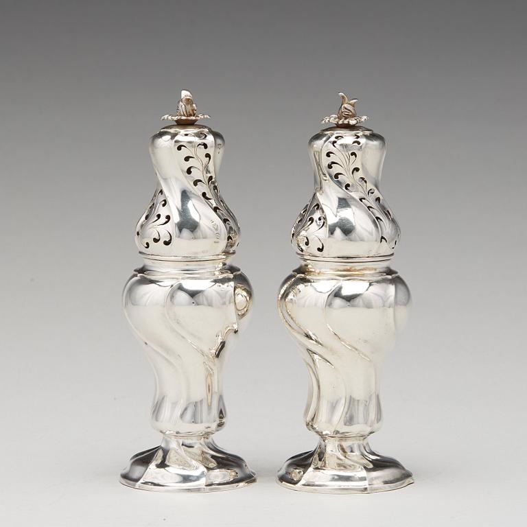 A matched pair of Swedish Rokoko silver sugar-casters, one marked Olof Gravander, Kristinehamn 1764, one a later copie.