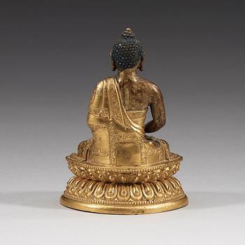 A Sino-Tibetan part-gilt bronze figure of Amitabha Buddha, 18th Century.