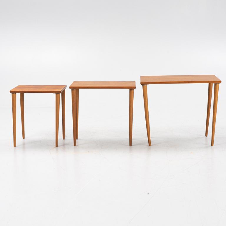A teak and oak nesting table, 1950s.