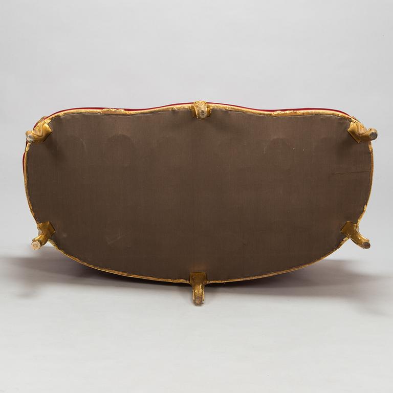 A late 19th century sofa in Louis XVI style.