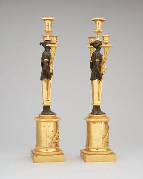 A pair of Swedish Empire early 19th century three-light candelabra.