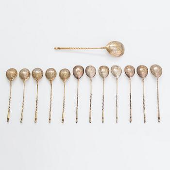 Twelve parcel-gilt teaspoons and a jam spoon, Russia 1887-1926.