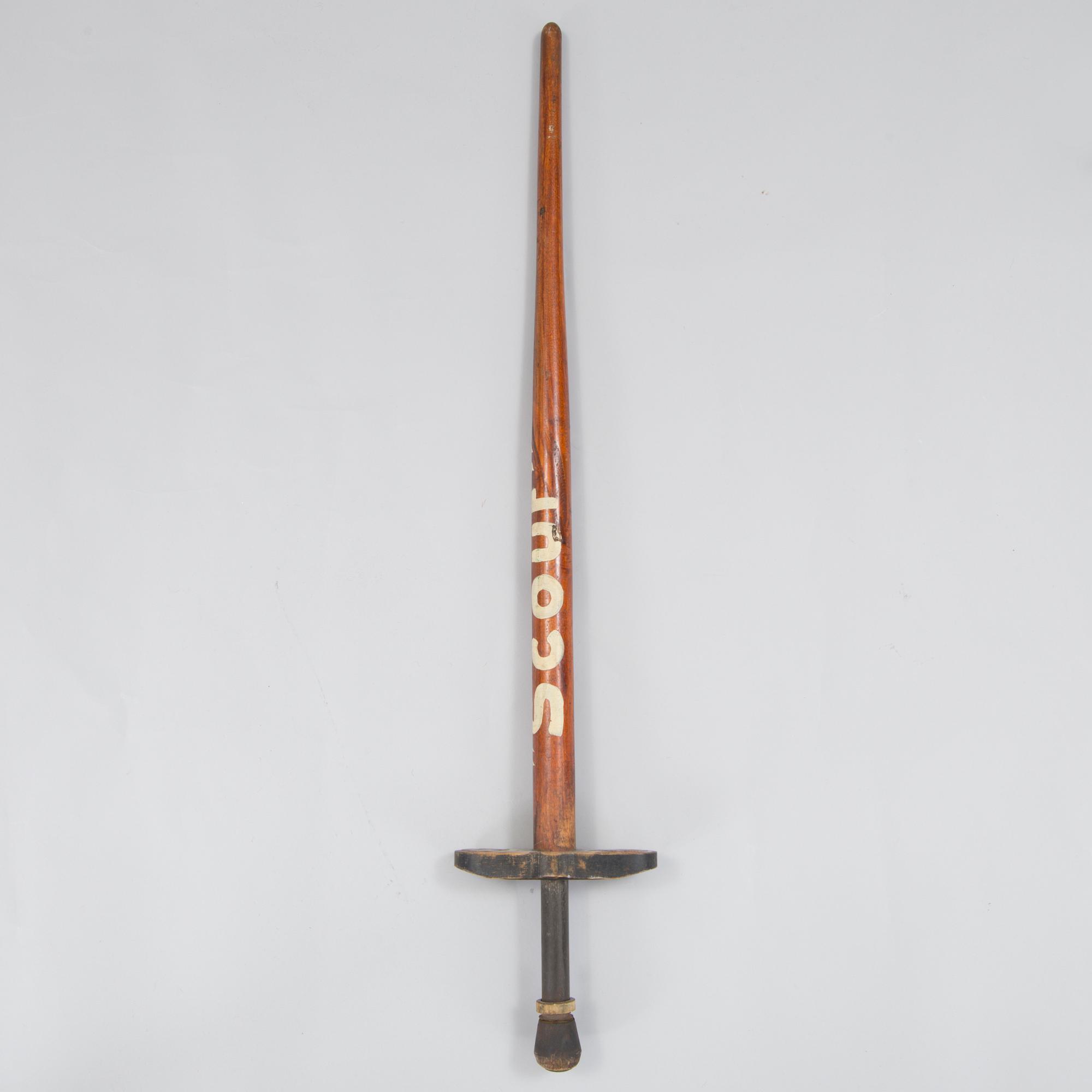 A 20th century wood pogo stick.