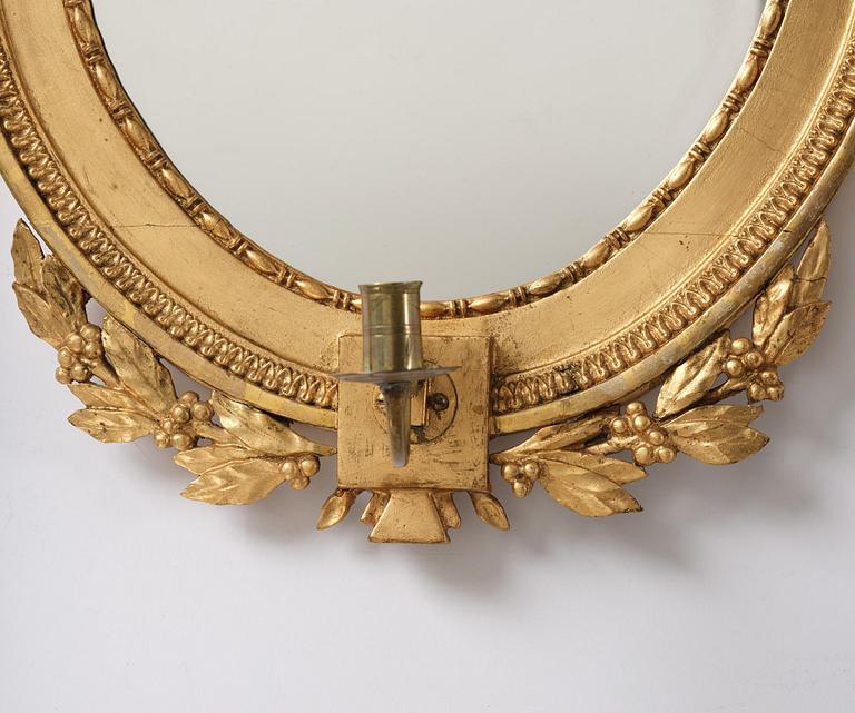 A pair of late Gustavian giltwood one light girandoles, Stockholm, circa 1800.