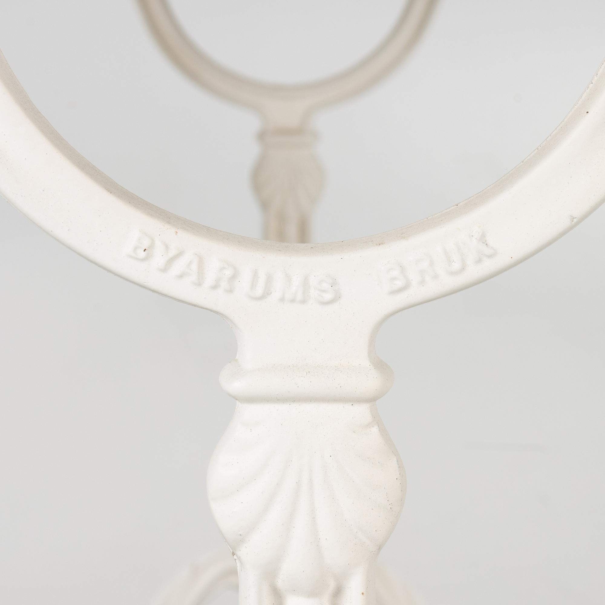 A set of seven garden chairs and two tables Byarums bruk, later part of the 20th century.