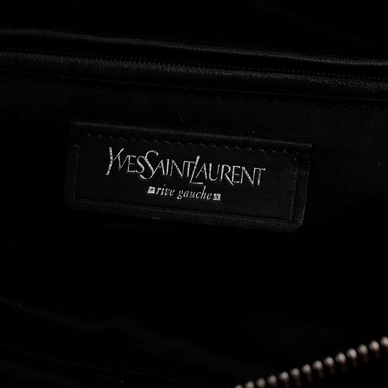 YVES SAINT LAURENT, a black fabric tote with leather details.