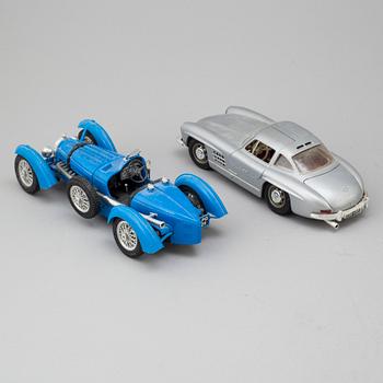 Four toy cars, Bburago, Italy, late-20th century.