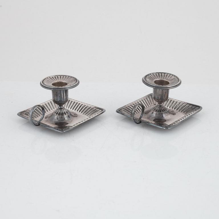 A pair of Swedish silver candlesticks, mark of CG Hallberg, Stockholm 1916.