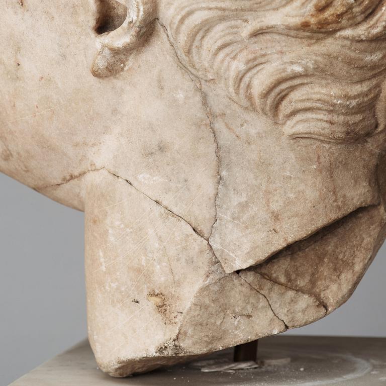 A marble portrait head of an athlet, Roman 150 AD or later ie until modern times.