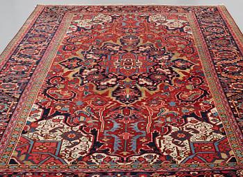 A CARPET, a semi-antique Heriz, ca 329-340 x 223,5-232 cm.