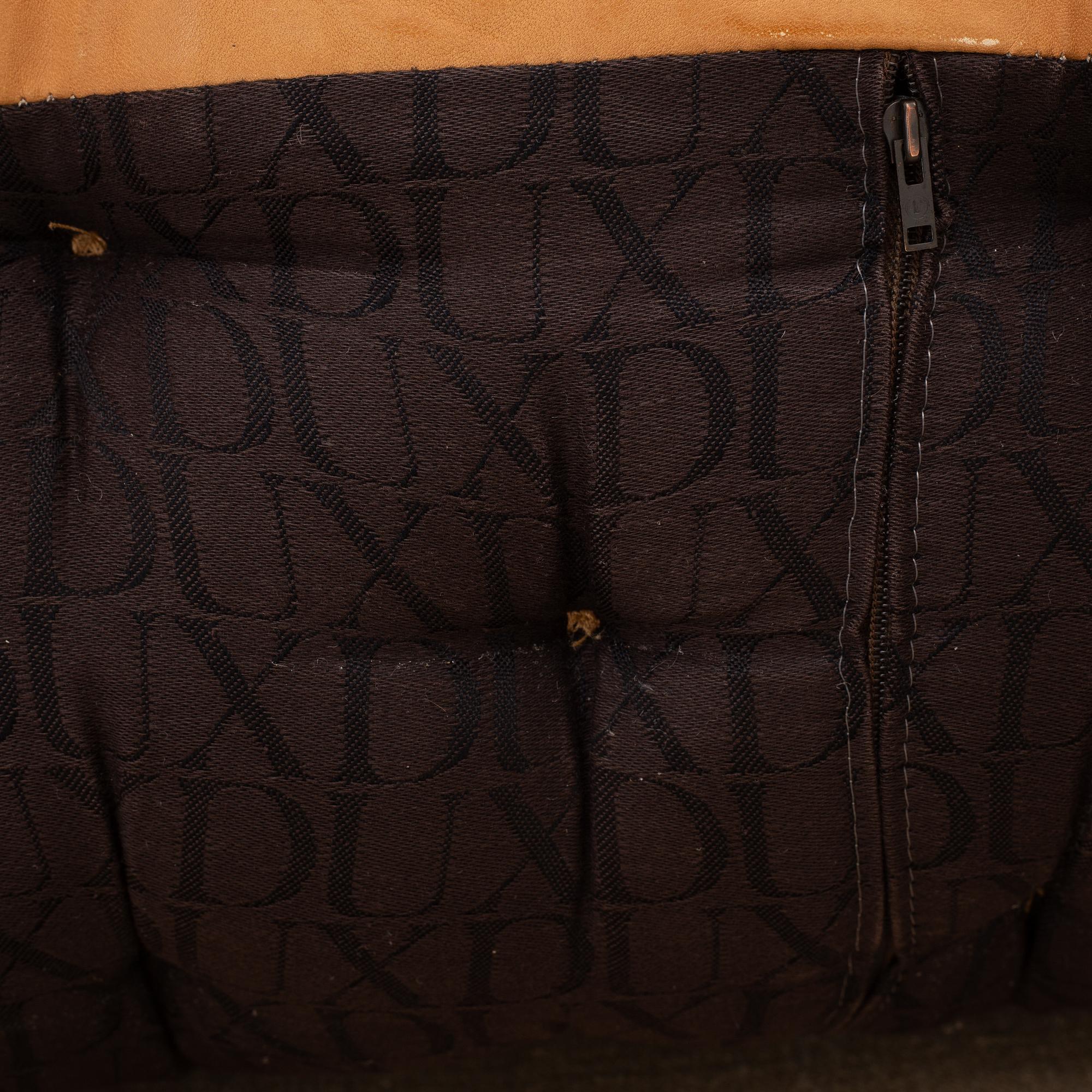 Bruno Mathsson, a pair of "Karin" armchairs, Dux, Sweden, late 20th century.