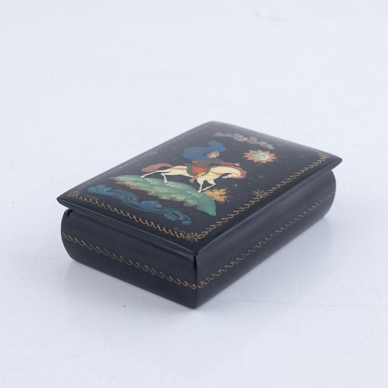A set of three Russian lacquered papier-maché boxes, one of which from the Lukutin manufactory, 19th -20th century.