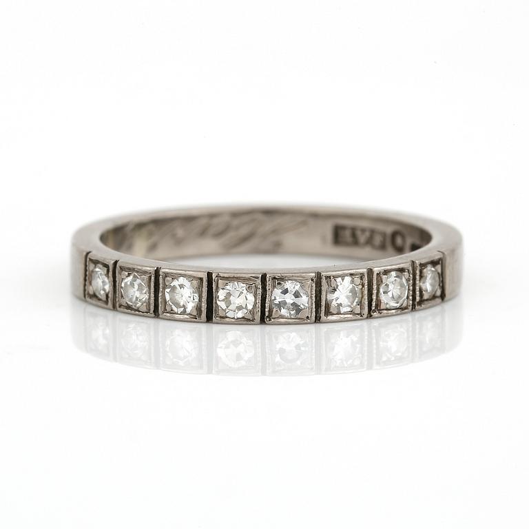 HALVALLIANSRING, med diamanter, totalt ca 0,18 ct, Fors Haldor Vidar, Stockholm, 1958, 18K vitguld.