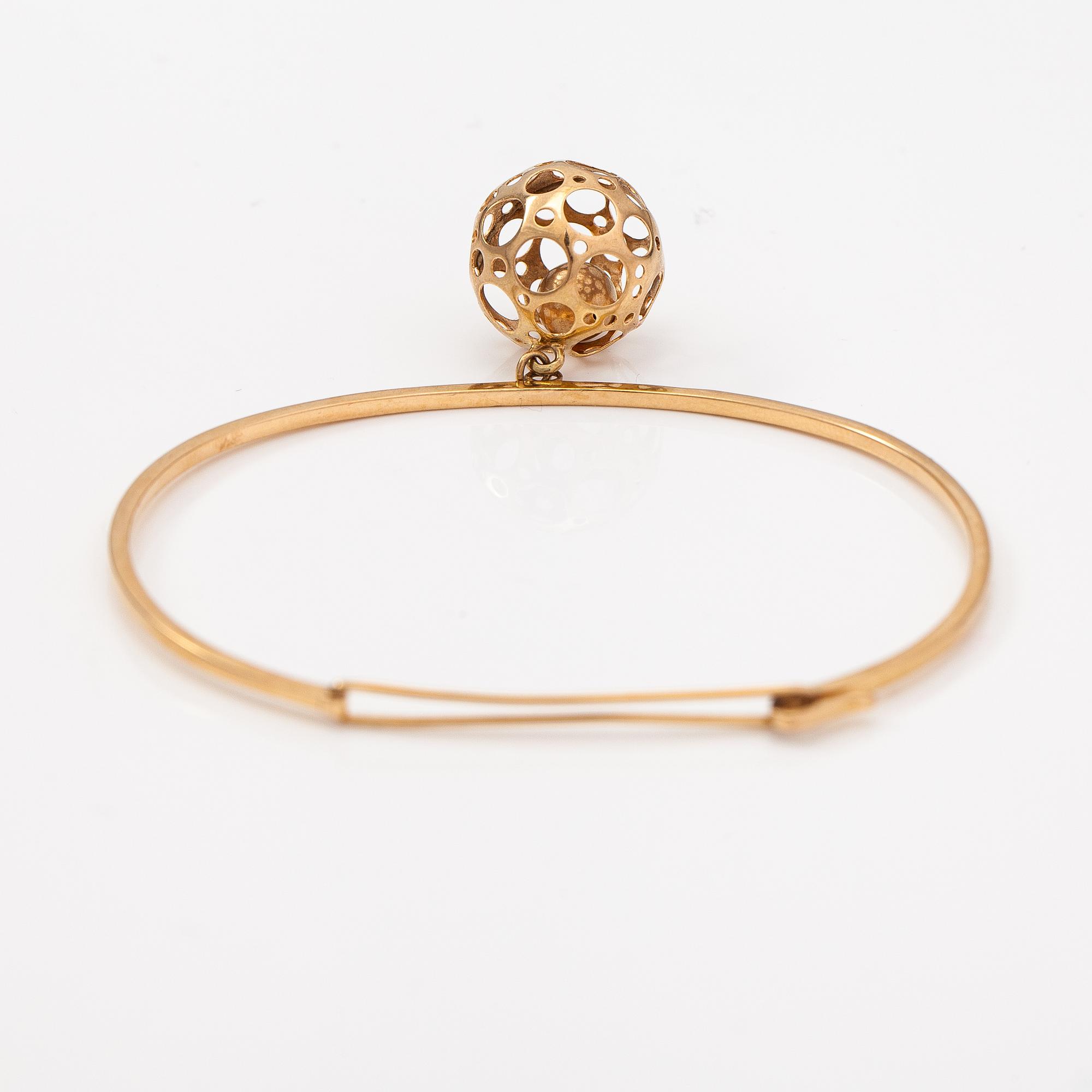 Liisa Vitali, A 14K gold bracelet "Leppäkerttu". Westerback, Helsinki 1969.