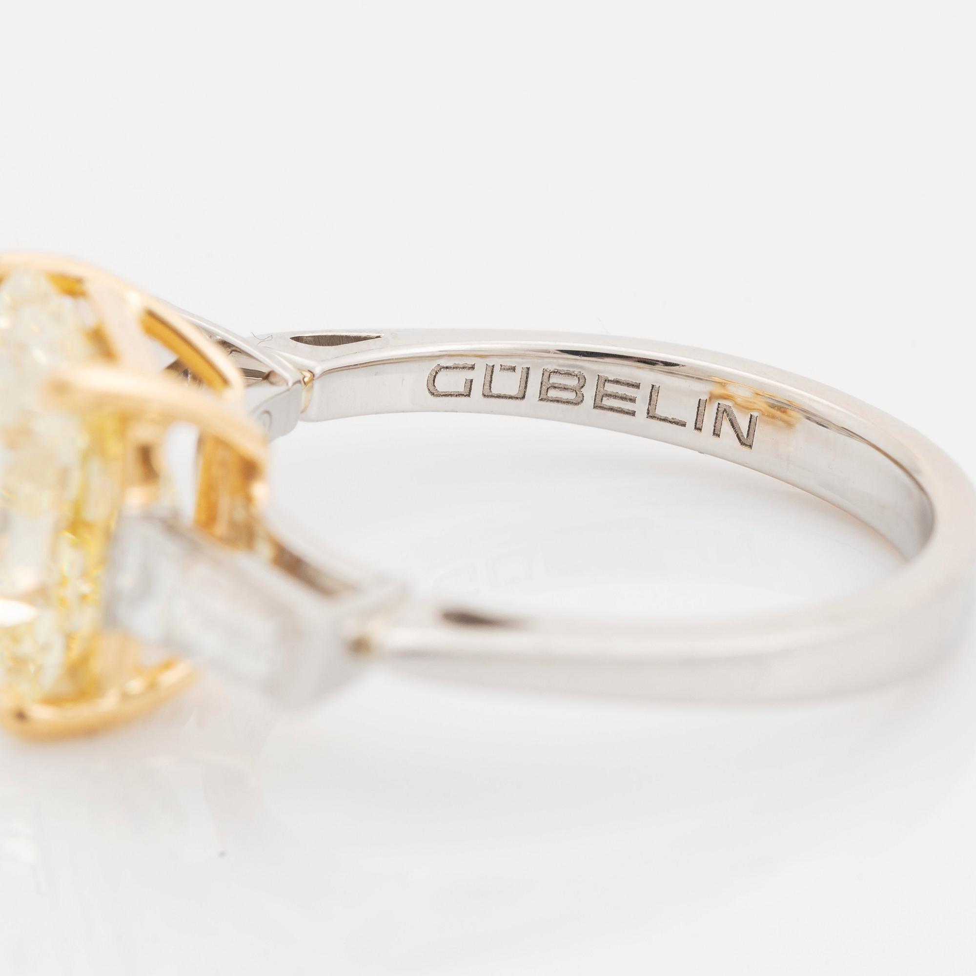 Gübelin ring platina och 18K guld med en radiantslipad diamant 3.21 ct Fancy Intense Yellow vvs 1.