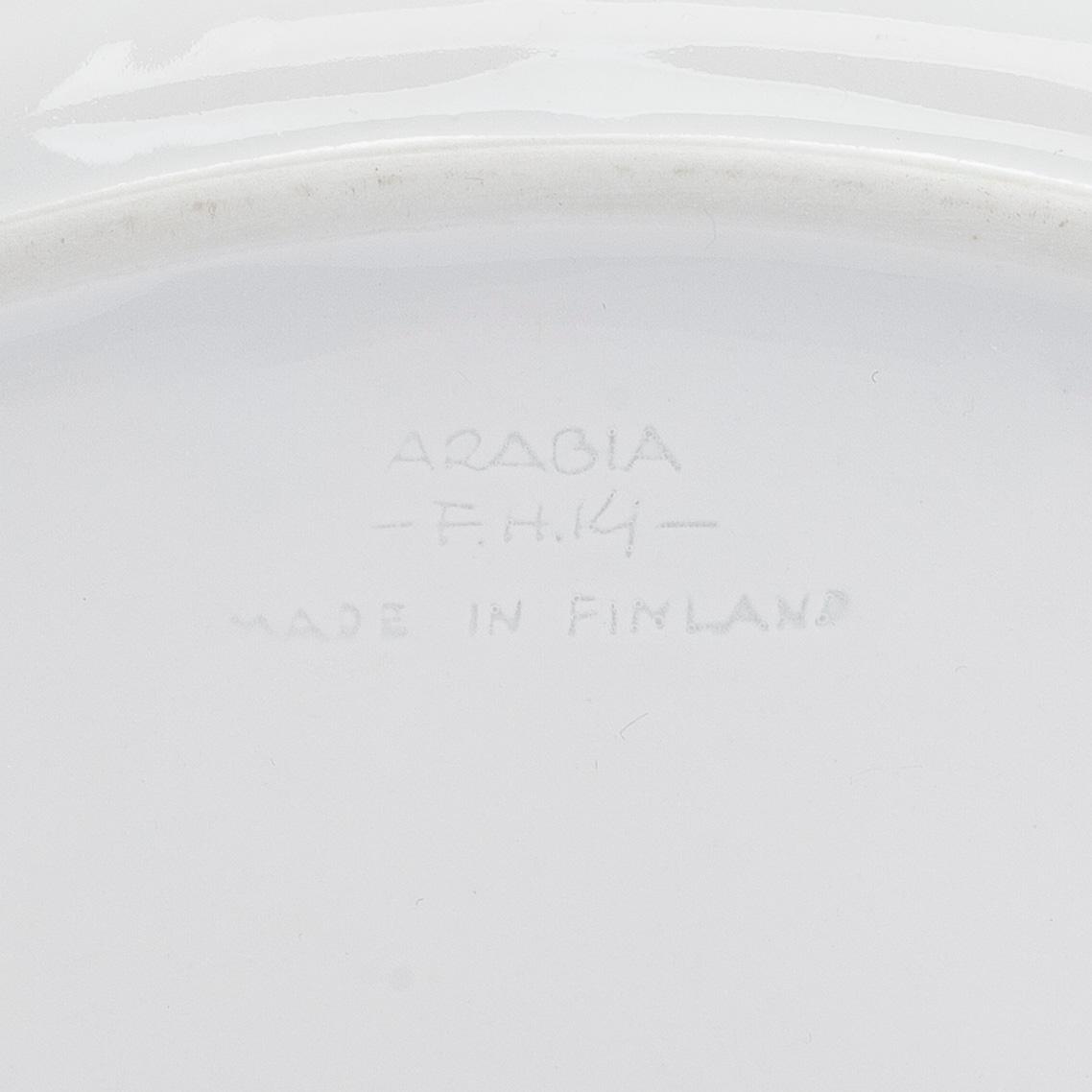 Friedl Holzer-Kjellberg, three porcelain candle holders and a "Helmi" plate, Arabia, 1970s.