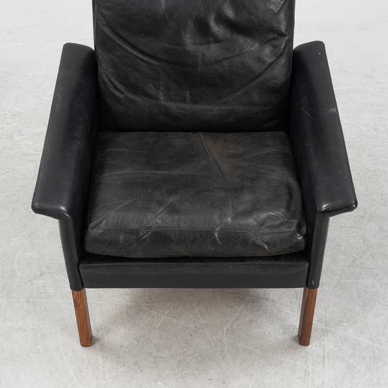 Hans Olsen,  a black leather easy chair with a stool, CS Möbler, Denmark, 1950's-60's.