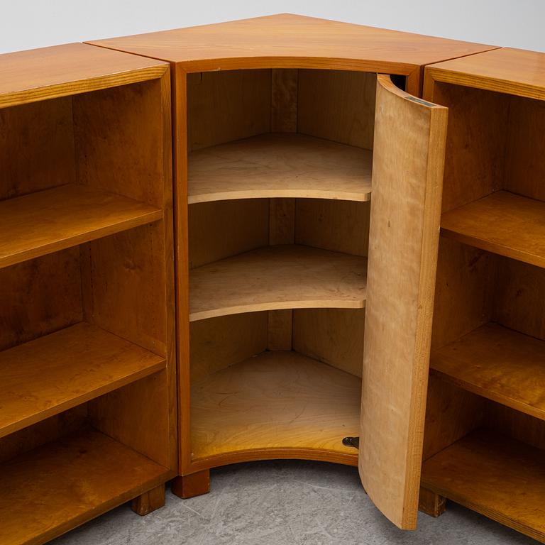 A corner bookcase, three sections, 1940's.
