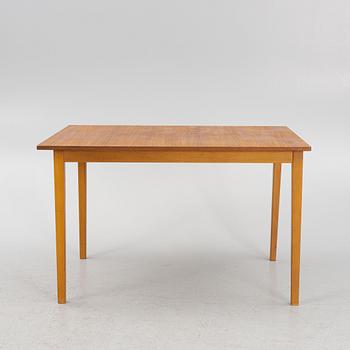 A teak-veneered dining table, 1960's/70's.