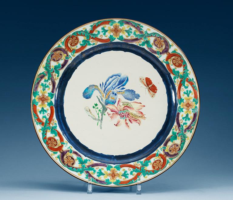 A large famille rose 'Euroepan subject' charger, Qing dynasty, ca 1740.
