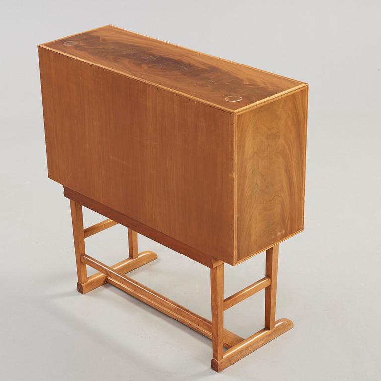 Josef Frank, a mahogany secretaire, model 1036, Svenskt Tenn Sweden, probably 1940-50's.