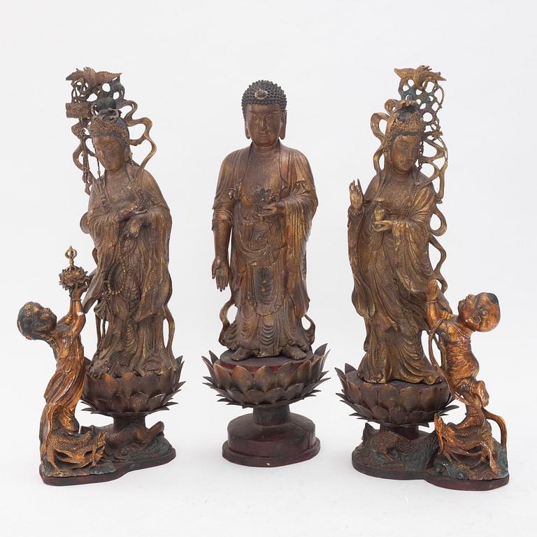 A large gilt and lacquer sculpture group, three parts, 20th century.