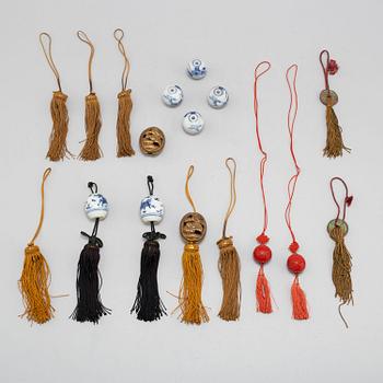 Eight (6+2) tassles, porcelain and bronze, Japan, 20th century.
