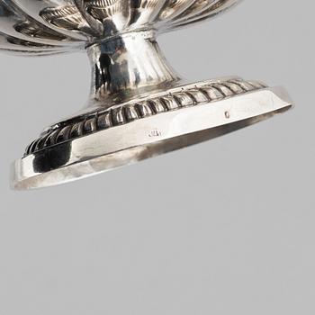 A silver sugar caster from E. S. Barnsley & Co, Birmingham,  1914, and a silver salt cellar with indistinct marks.