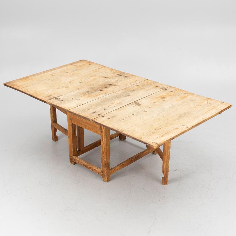 A 19th century gate-leg table.