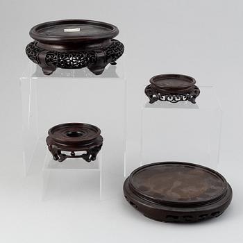 A group of chinese wooden stands, 19th/20th Century. (12 pieces).