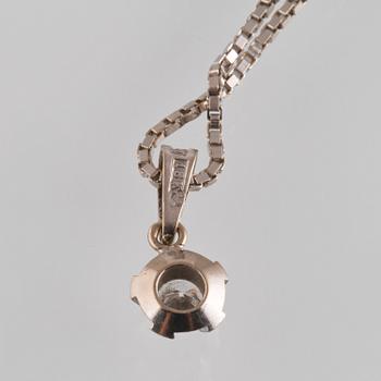 HÄNGE, 18K vitguld med briljantslipad diamant ca 0.23 ct, Bims guldsmide Göteborg. Vikt 4,8 gram.