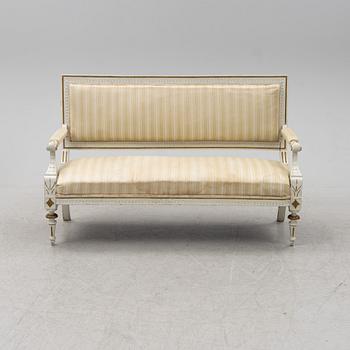 A Gustavian style sofa, circa 1900.