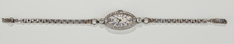 SMYCKESUR, dam. Tissot Locle. 14K guld. Briljant- och 8/8 slipade diamanter ca 1.00 ct. 1920/30-tal. Vikt 17,7 g.