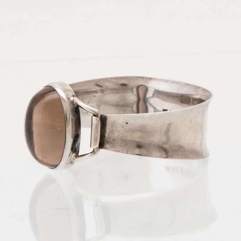 Silver bracelet with cabochon-cut smoky quartz, Gussi Malmö 1964.