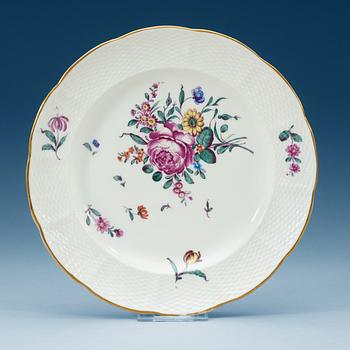 A set of 12 Ludwigsburg dinner plates, 18/19th Century.