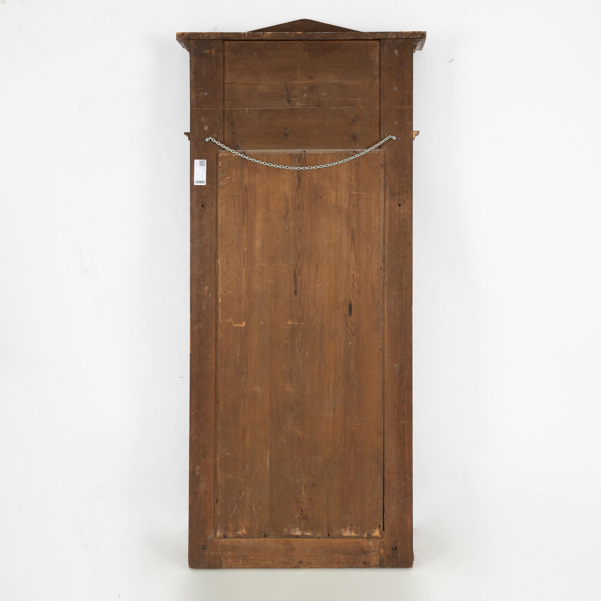 An Empire style mirrot, late 19th Century.