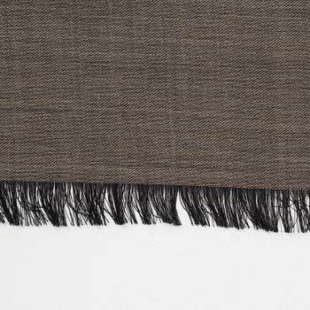 Gucci, a wool and silk mix "GG" jaquard shawl.