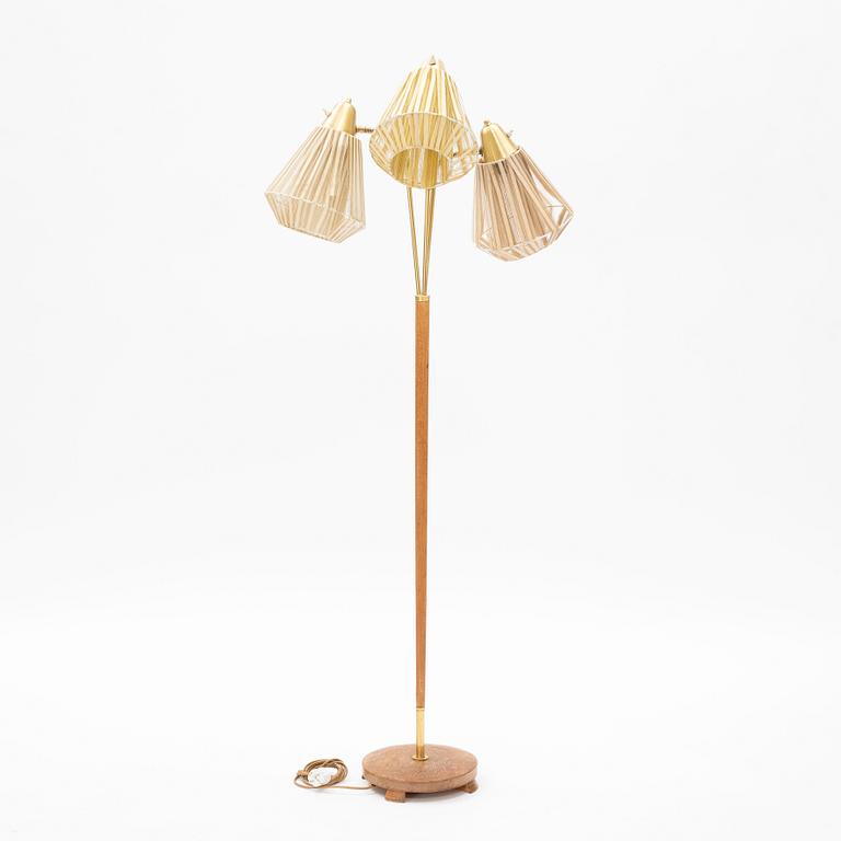 An oak three armed floor lamp from AB Armaturhantverk Göteborg.