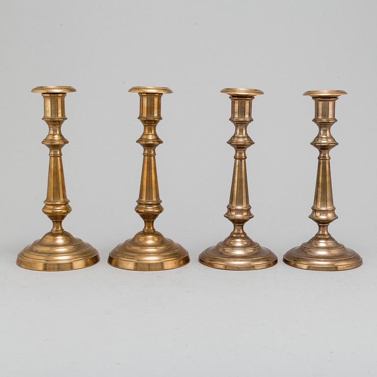 Four (2+2) brass candle holders, including Skultuna.