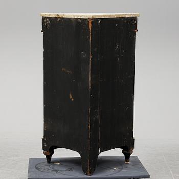 A 19th century corner cabinet.