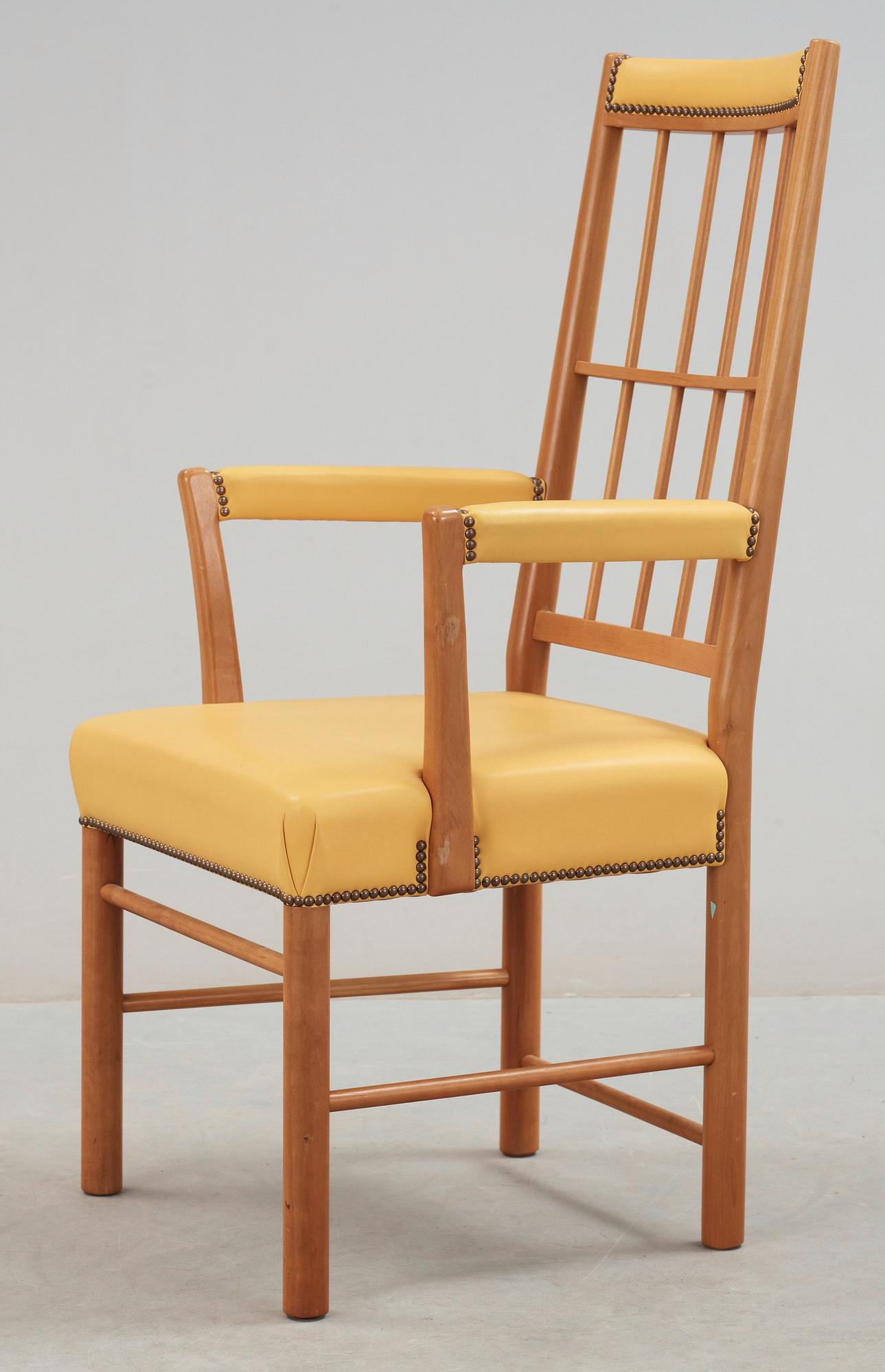 A Josef Frank cherry and yellow leather armchair, Svenskt Tenn, model 652.