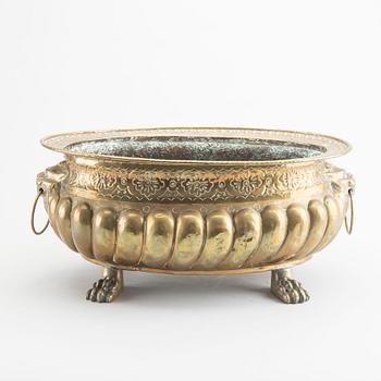 A Baroque style brass vine cooler 19th century.