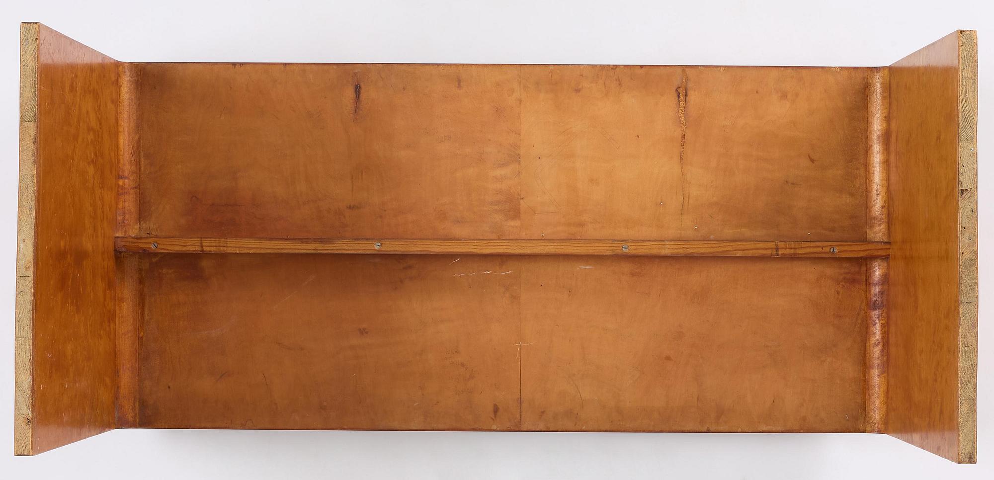 Swedish Modern, a birch veneered coffee table, 1930s-40s.