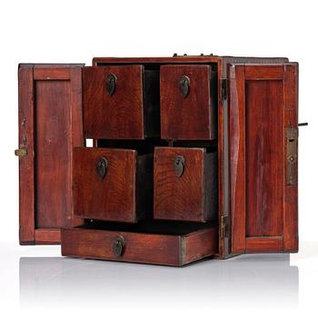 A Chinese hardwood cabinet/medicine chest, Qing dynasty/early 20th century.