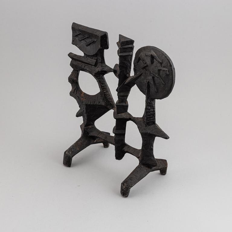 OLLE HERMANSSON, a cast iron sculpture, marked Husqvarna.